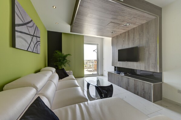 Luxury Apartment, 3 Bedrooms | Living area | 42-inch flat-screen TV with cable channels, LCD TV - The Apex (St. Julian's)