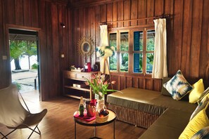 Beachfront Suite | Living room | 20-inch TV with cable channels - Sok San Beach Resort (Koh Rong)