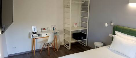 Premium bedding, down comforters, pillowtop beds, in-room safe
