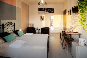 Superior Triple Room, Balcony, City View | Frette Italian sheets, premium bedding, down duvets, minibar