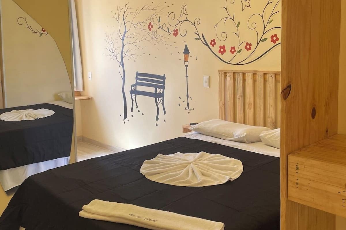 Egyptian cotton sheets, down comforters, desk, laptop workspace