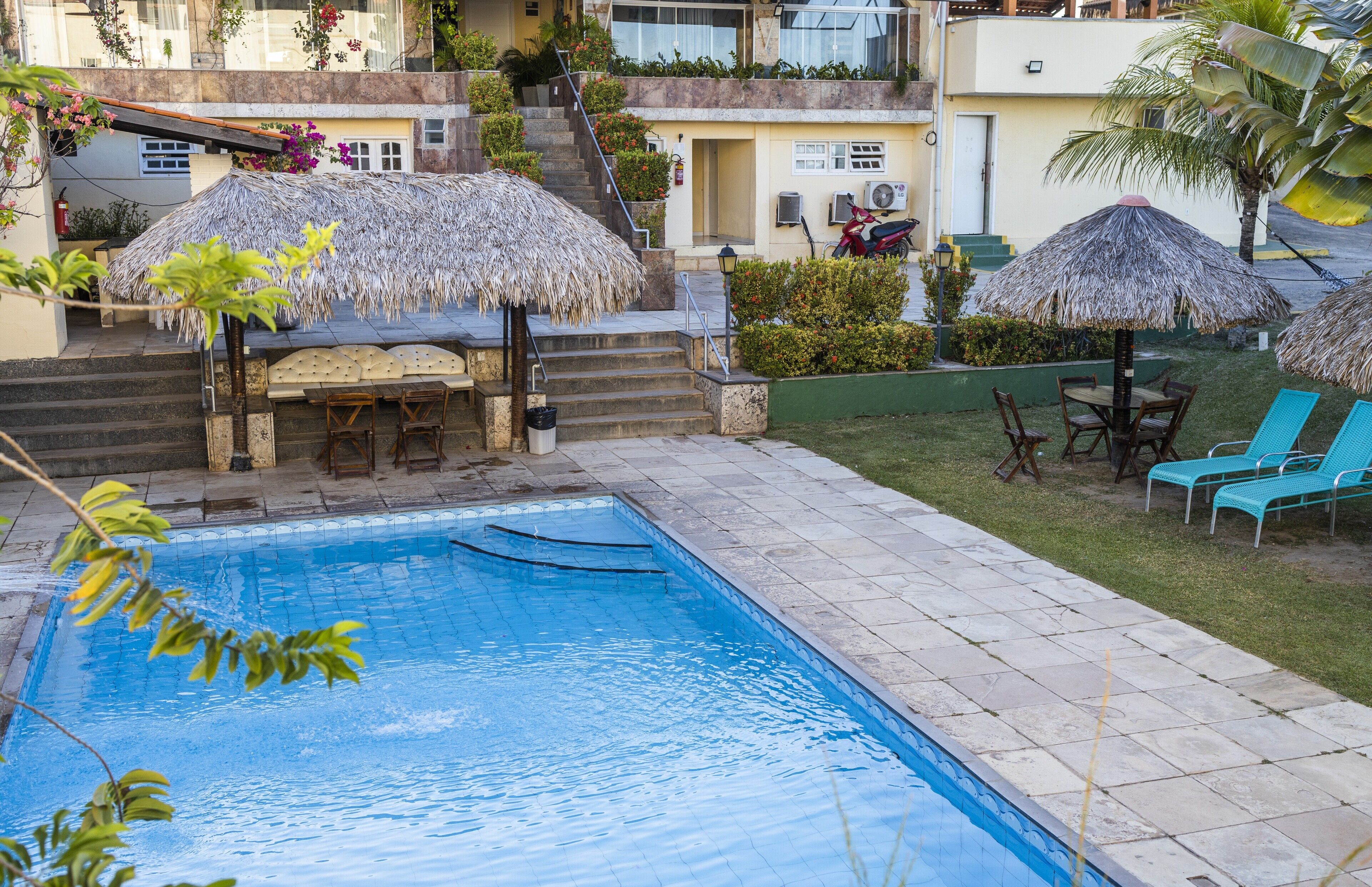 Outdoor pool, open 7:00 AM to 10:00 PM, free cabanas, pool umbrellas