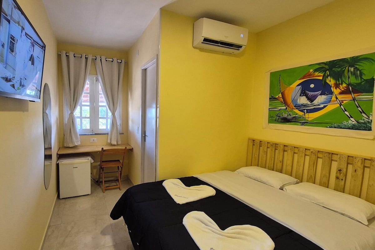 Egyptian cotton sheets, down duvets, desk, laptop workspace
