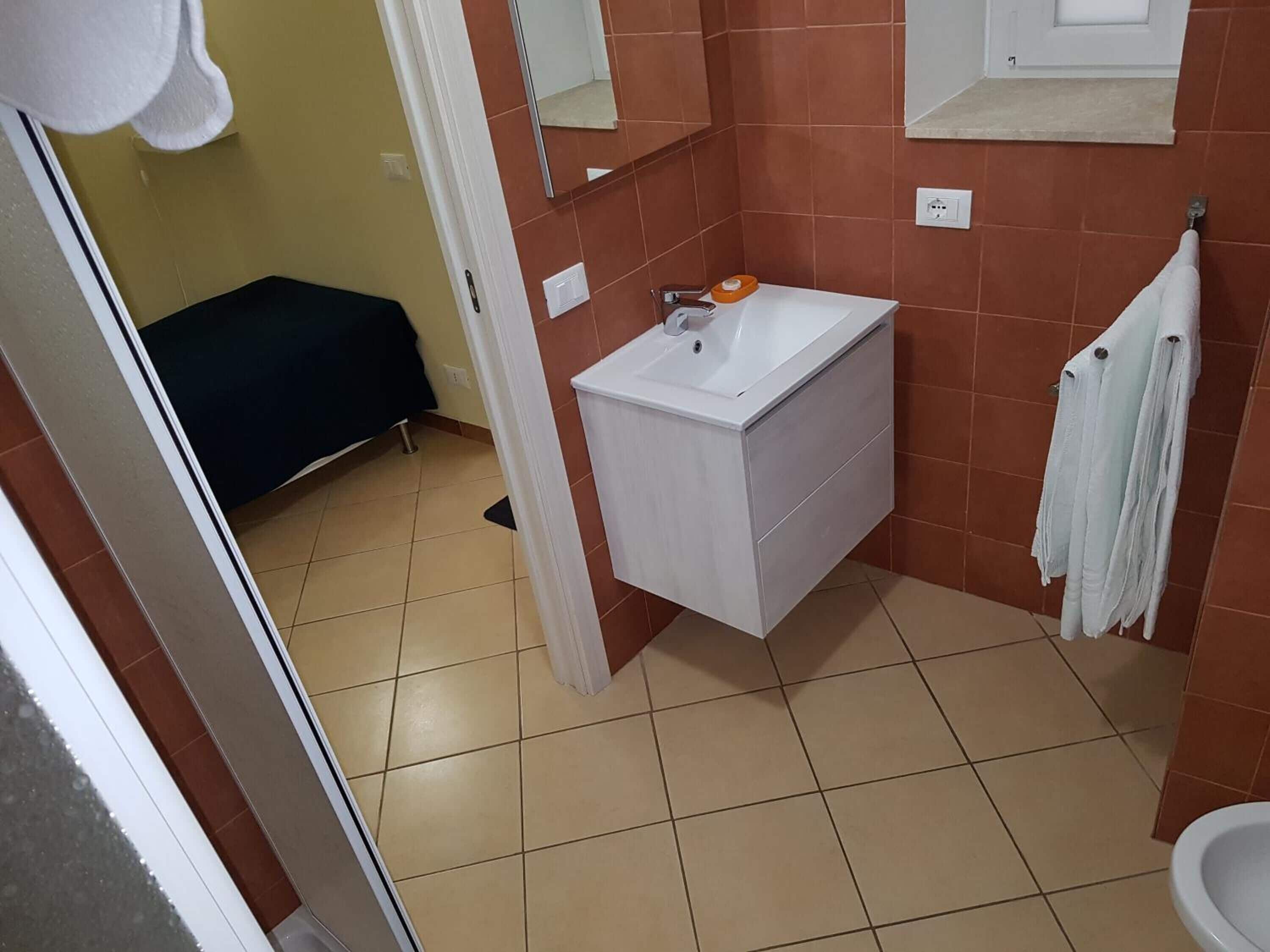 Shower, free toiletries, hair dryer, bathrobes