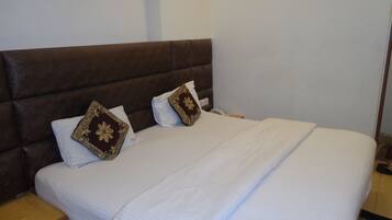 Deluxe Room Non AC | Desk, rollaway beds, free WiFi