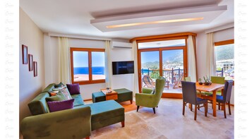 Comfort Apartment, 3 Bedrooms, Balcony, Sea View | Living area | Flat-screen TV