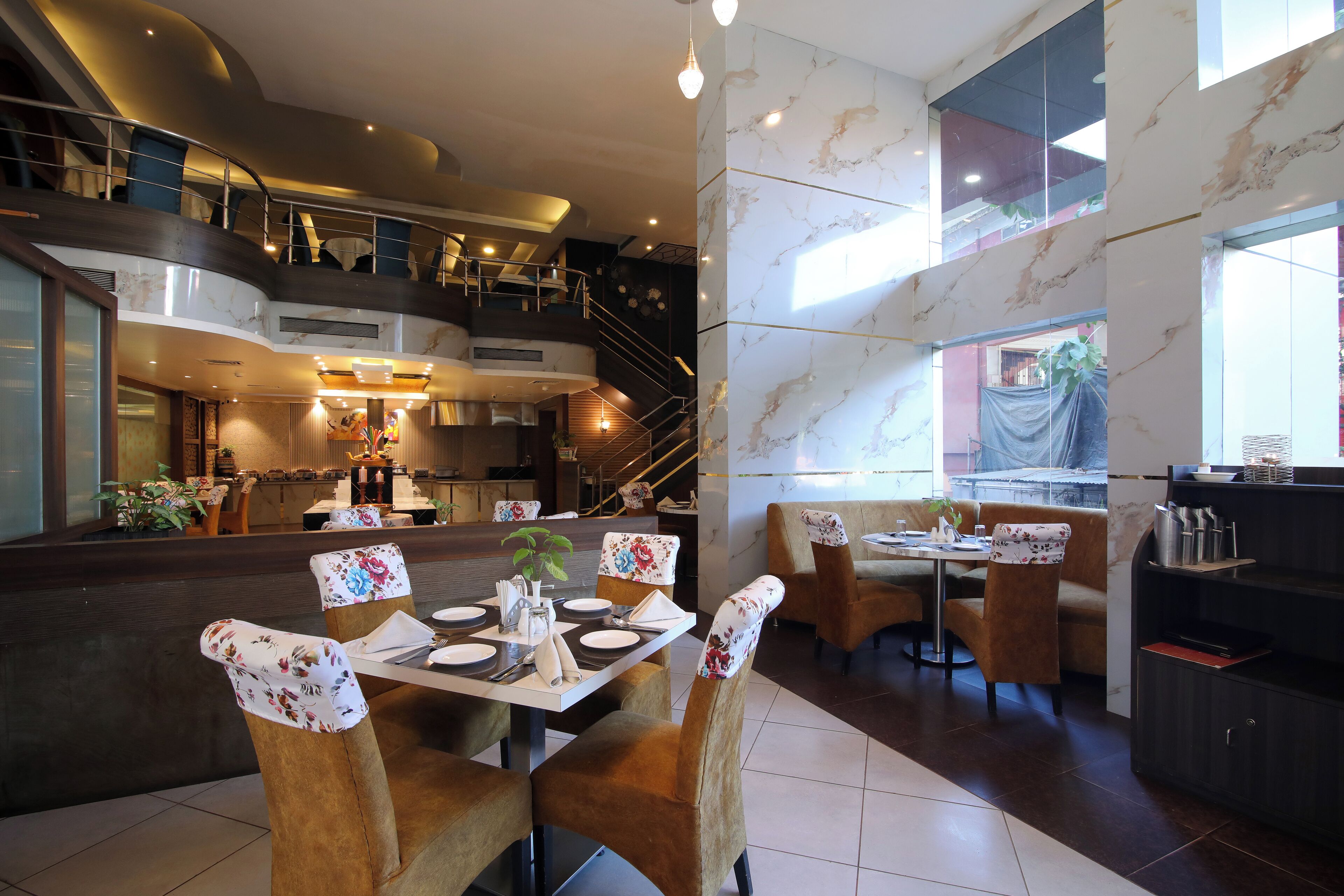 2 restaurants, breakfast, lunch, dinner served; Indian cuisine 