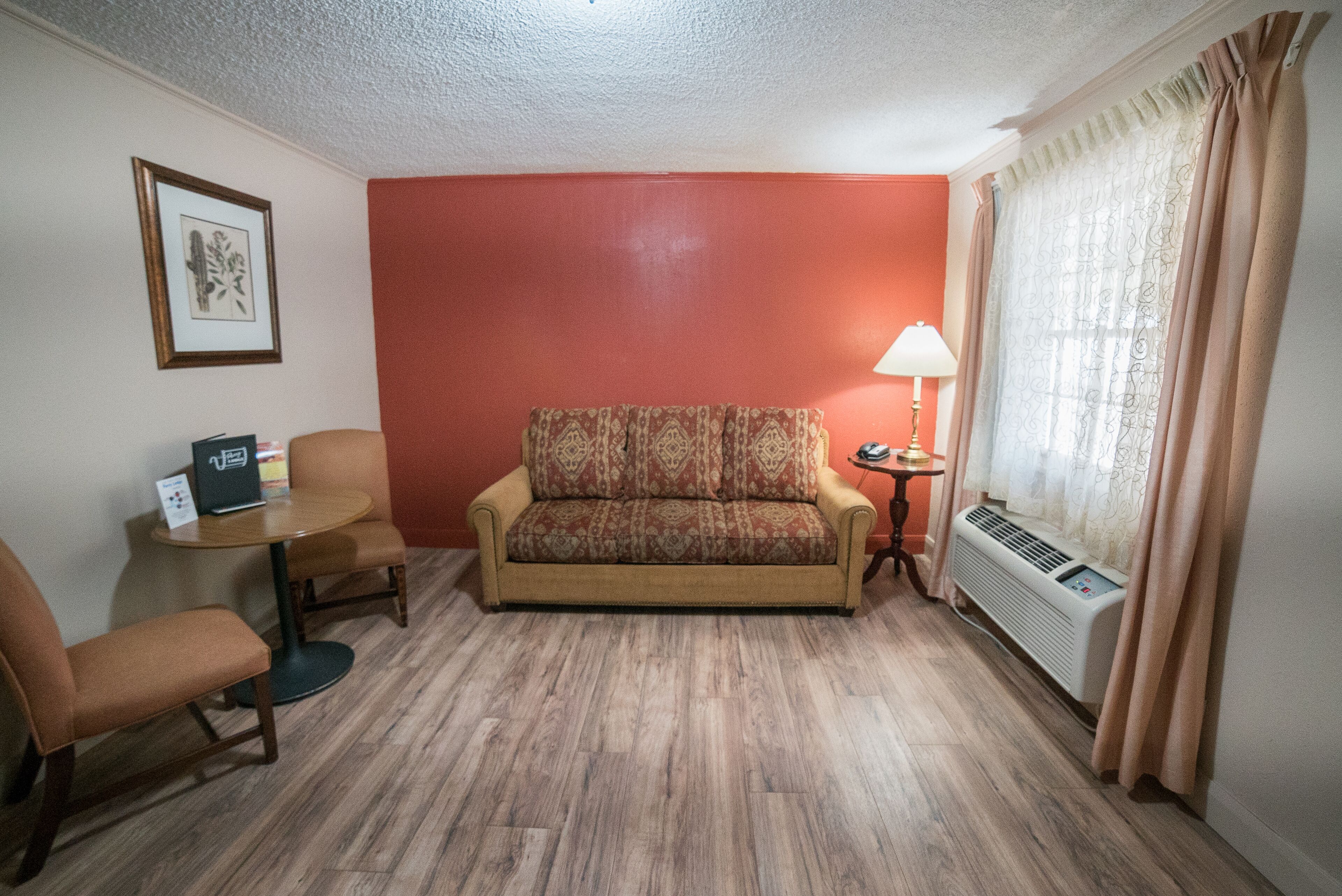 standard suite, 1 queen bed with sofa bed | living area | 32-inch flat-screen tv with cable channels, tv