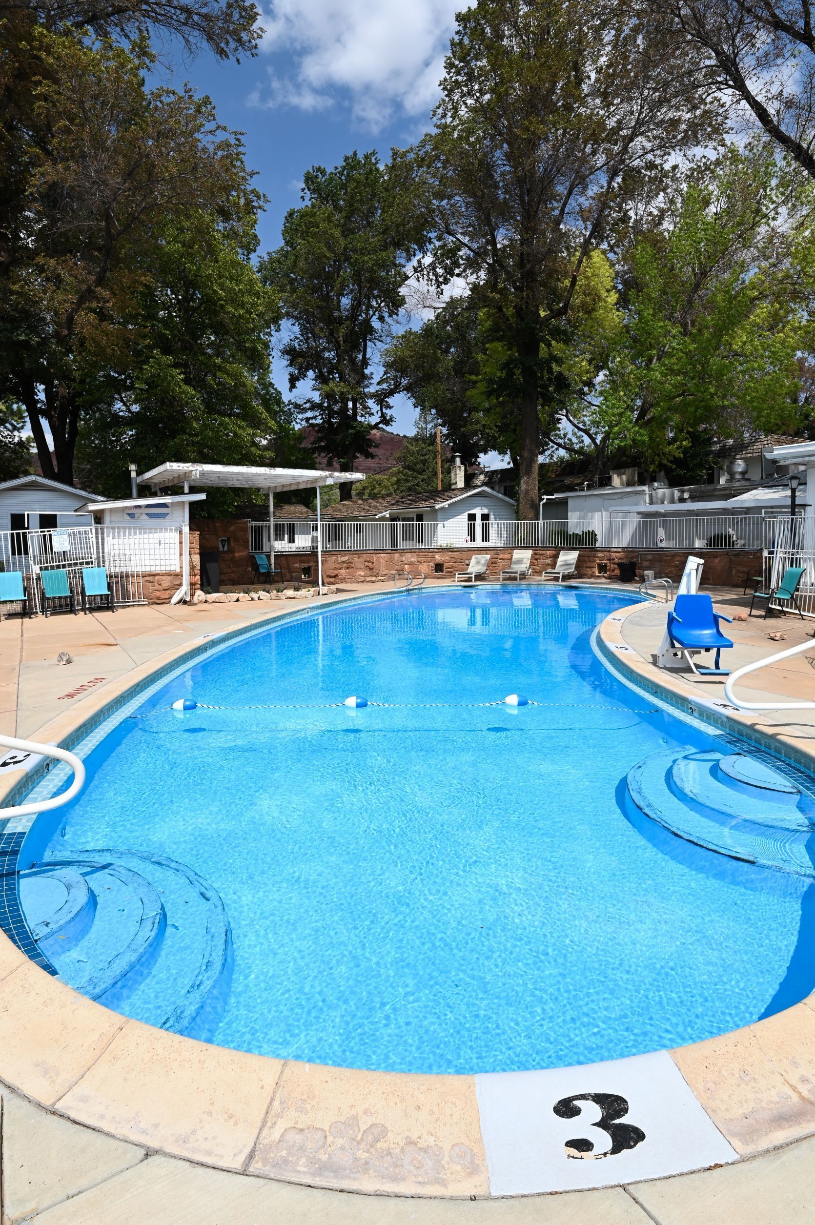 seasonal outdoor pool, open 10 am to 10 pm, pool loungers