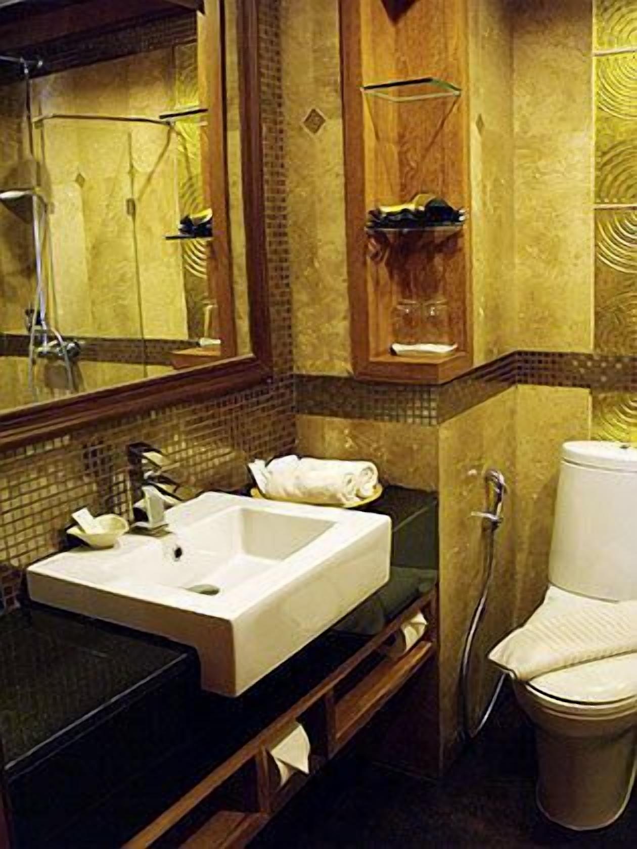 superior twin room | bathroom | shower, free toiletries, hair dryer, bathrobes