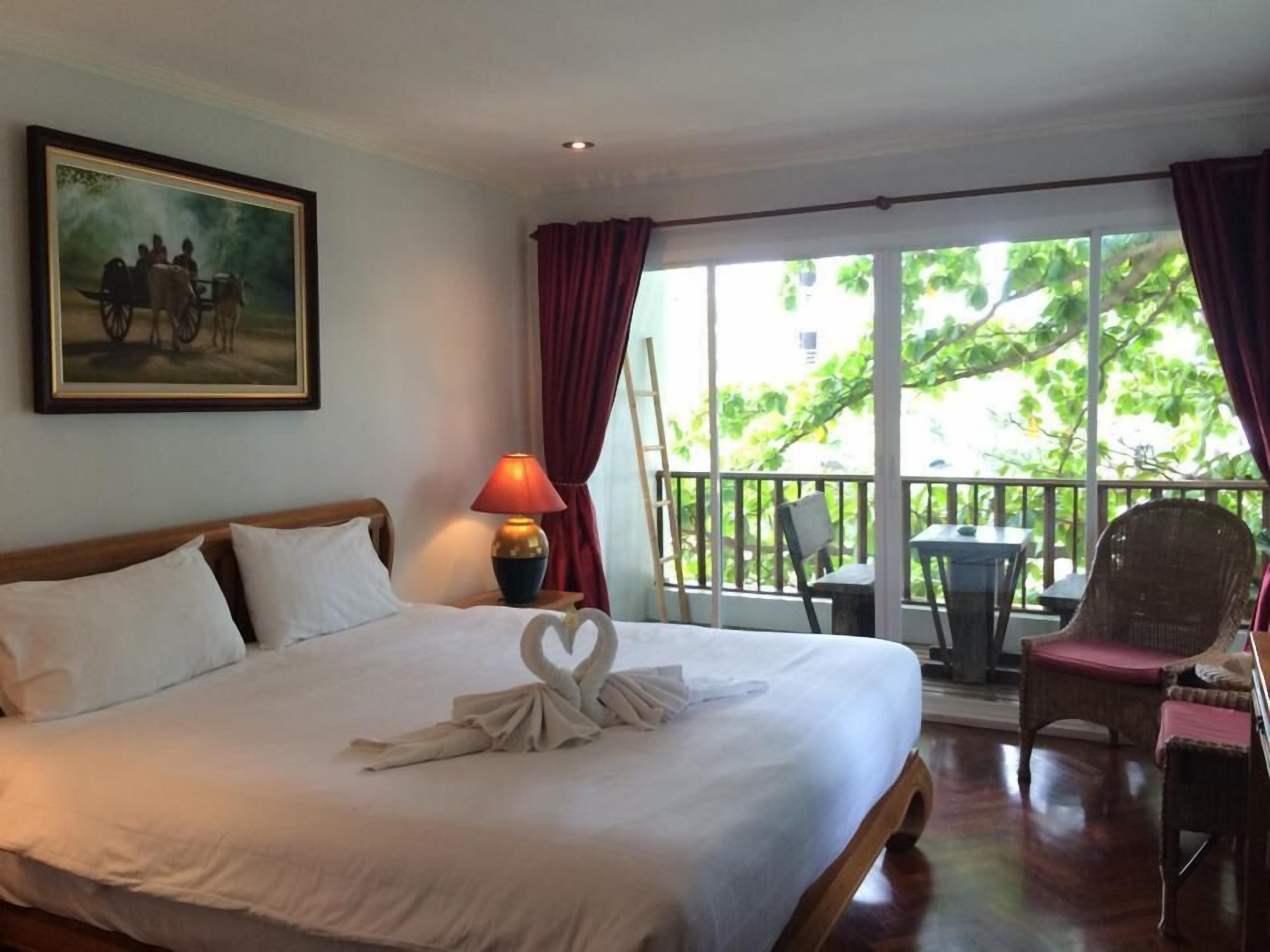 superior room, 1 king bed | 1 bedroom, in-room safe, desk, blackout curtains