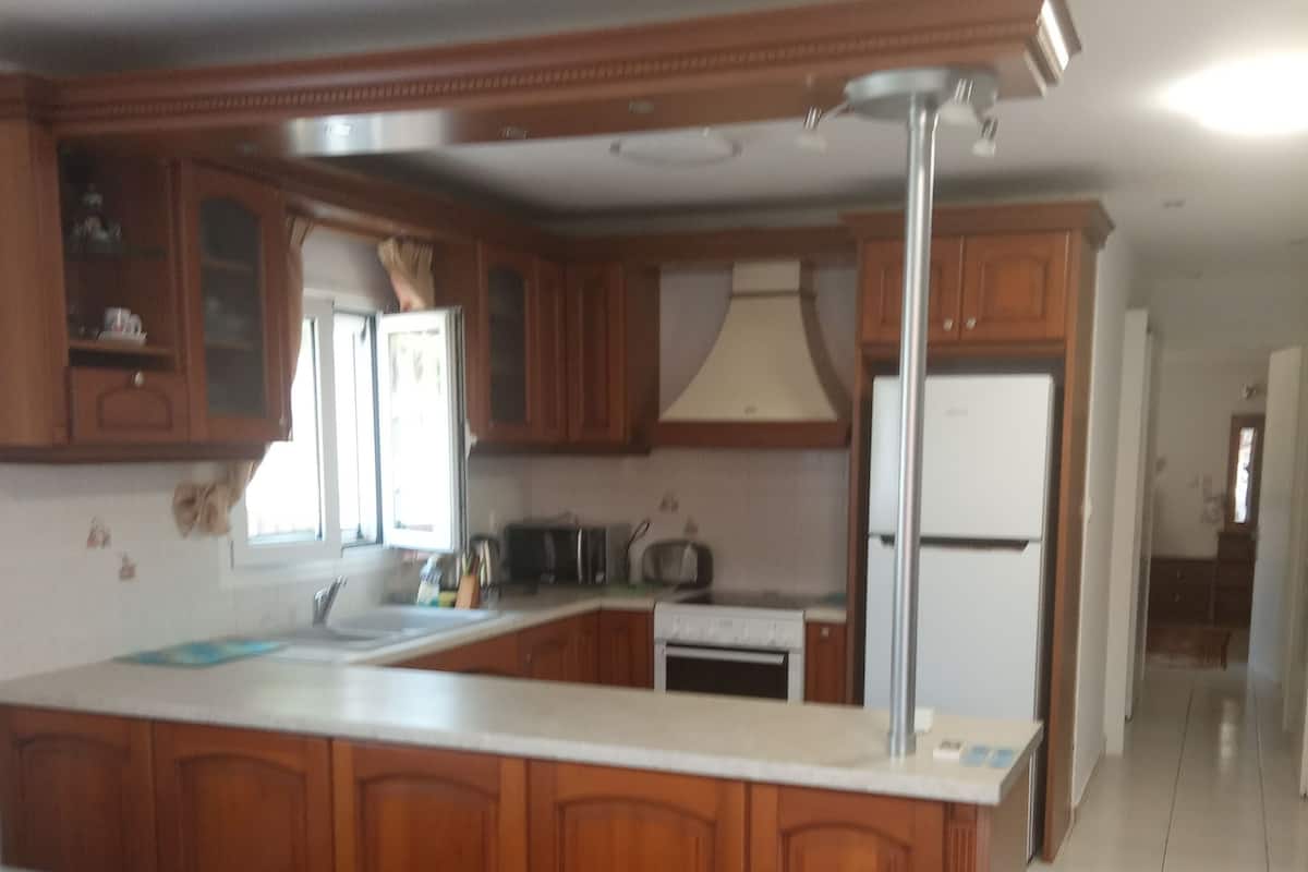 Luxury Apartment, 2 Bedrooms | Private kitchen | Fridge, microwave, cookware/dishes/utensils, cleaning supplies