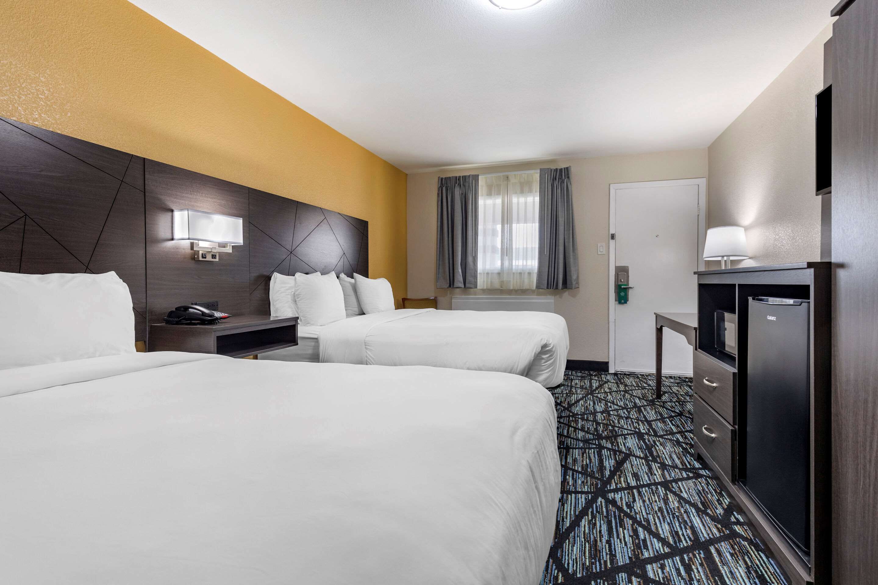 Standard Room, 2 Queen Beds, Non Smoking | Desk, free WiFi, bed sheets