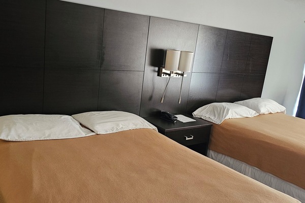 Comfort Room, 2 Double Beds, Non Smoking | In-room safe, desk, free WiFi, bed sheets