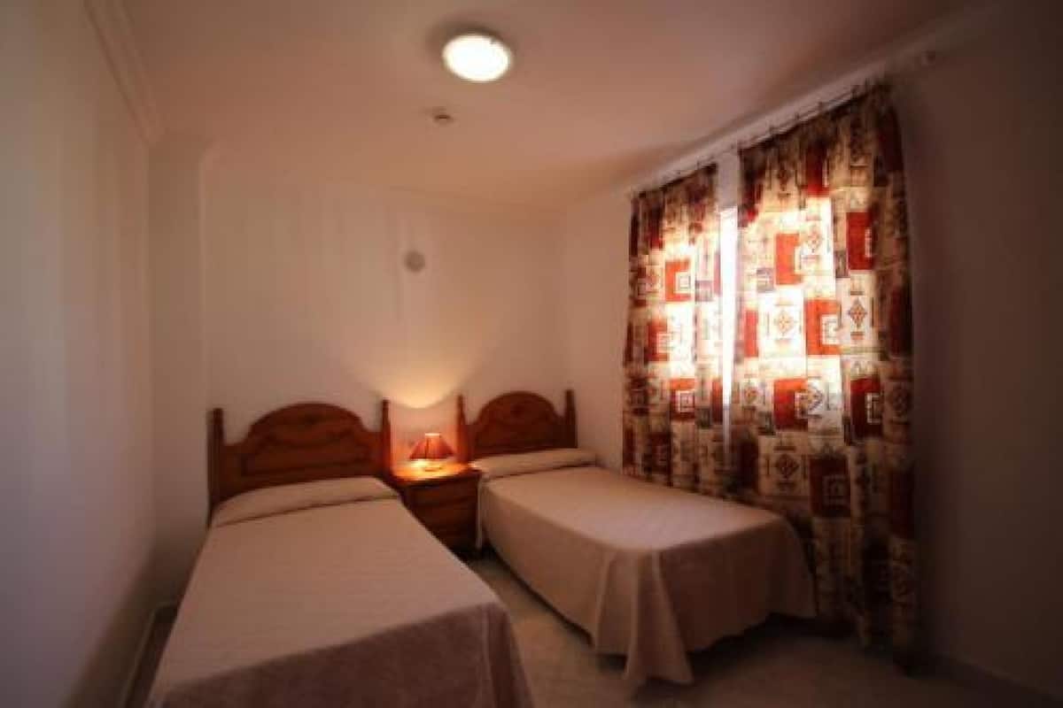 Blackout curtains, soundproofing, iron/ironing board, rollaway beds