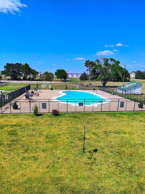 Seasonal outdoor pool, pool loungers