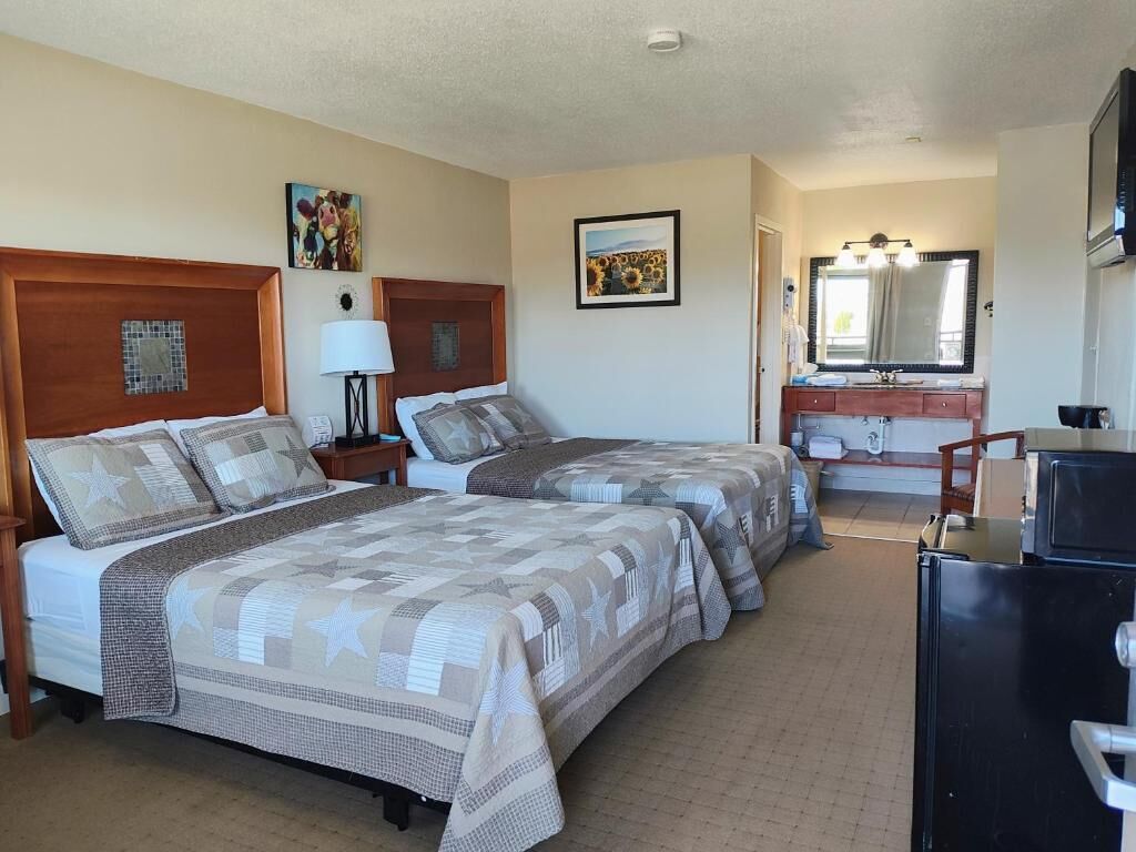 Economy Double Room, 2 Queen Beds | Premium bedding, blackout drapes, WiFi (free), bed sheets