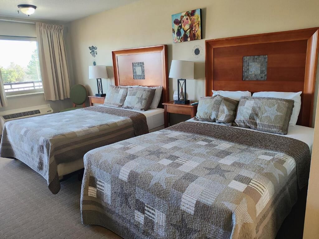 Economy Double Room, 2 Queen Beds | Premium bedding, blackout drapes, WiFi (free), bed sheets
