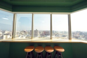 Chambre quadruple panoramique | Vue sur la ville