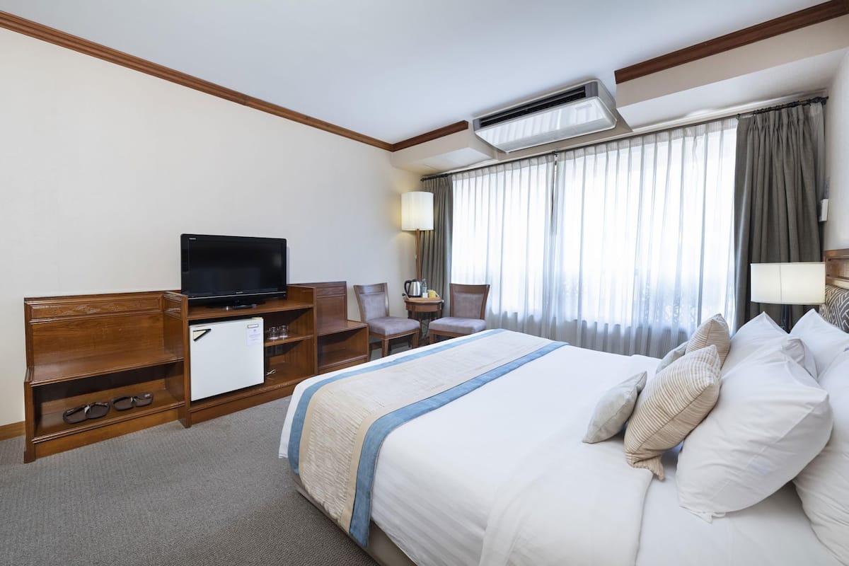 Blackout drapes, soundproofing, iron/ironing board (on request)