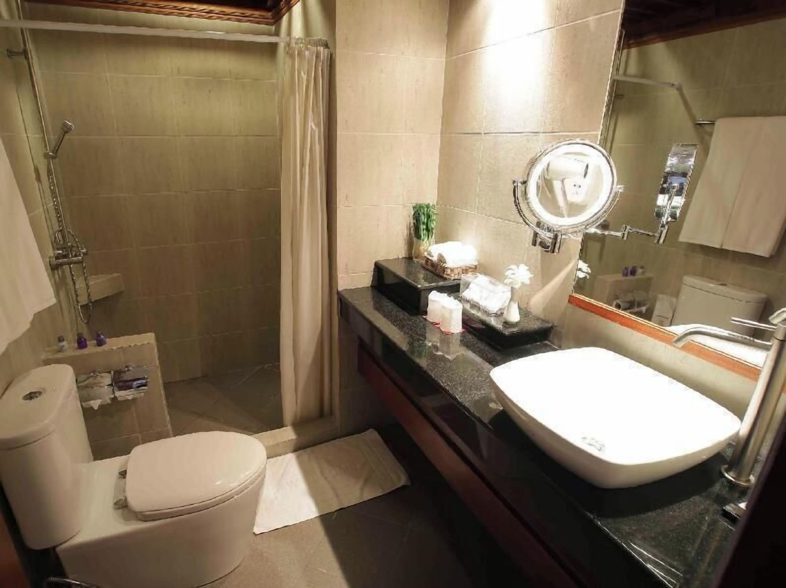 Bathroom | Shower, rainfall showerhead, eco-friendly toiletries, hair dryer