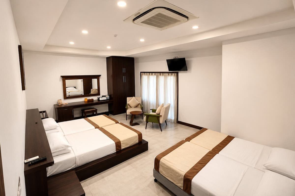 Standard Quadruple Room | Premium bedding, in-room safe, desk, blackout drapes