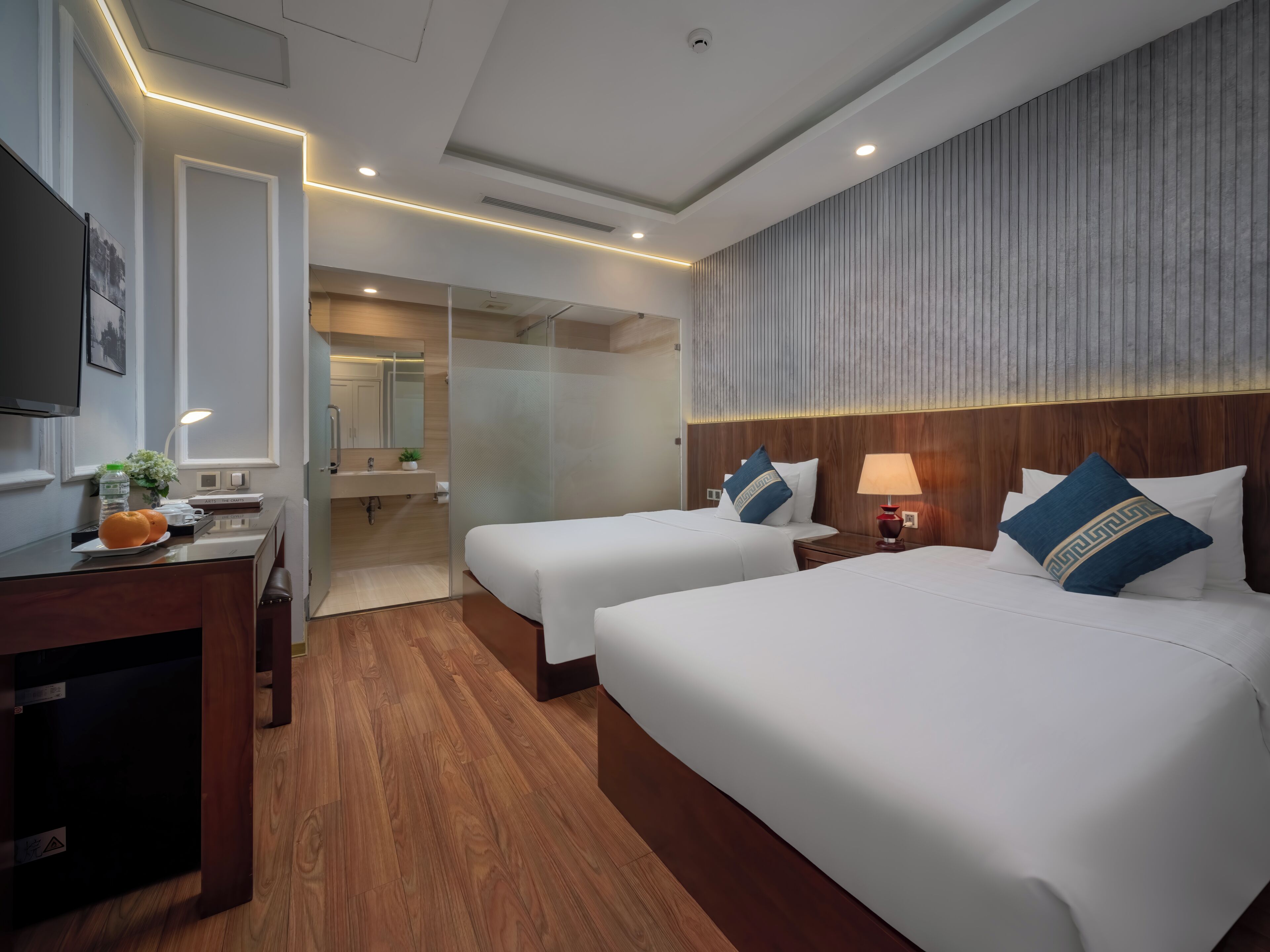Habitación Deluxe con 1 cama matrimonial o 2 individuales | Ropa de cama hipoalergénica y minibar 