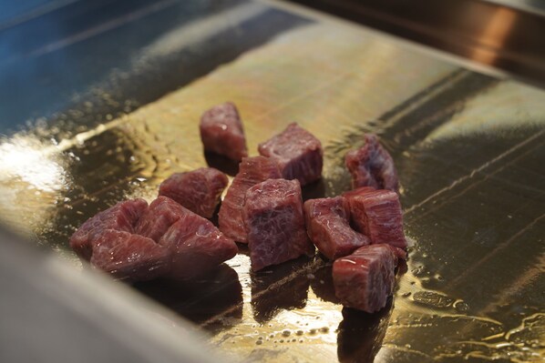 Raw meat on a reflective surface. - LiVEMAX RESORT Kaga Yamashiro (Kaga)