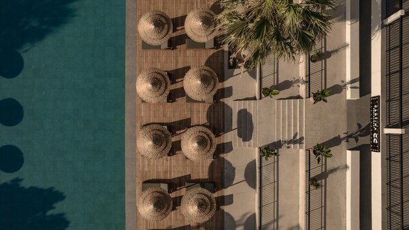 2 outdoor pools, pool umbrellas, pool loungers