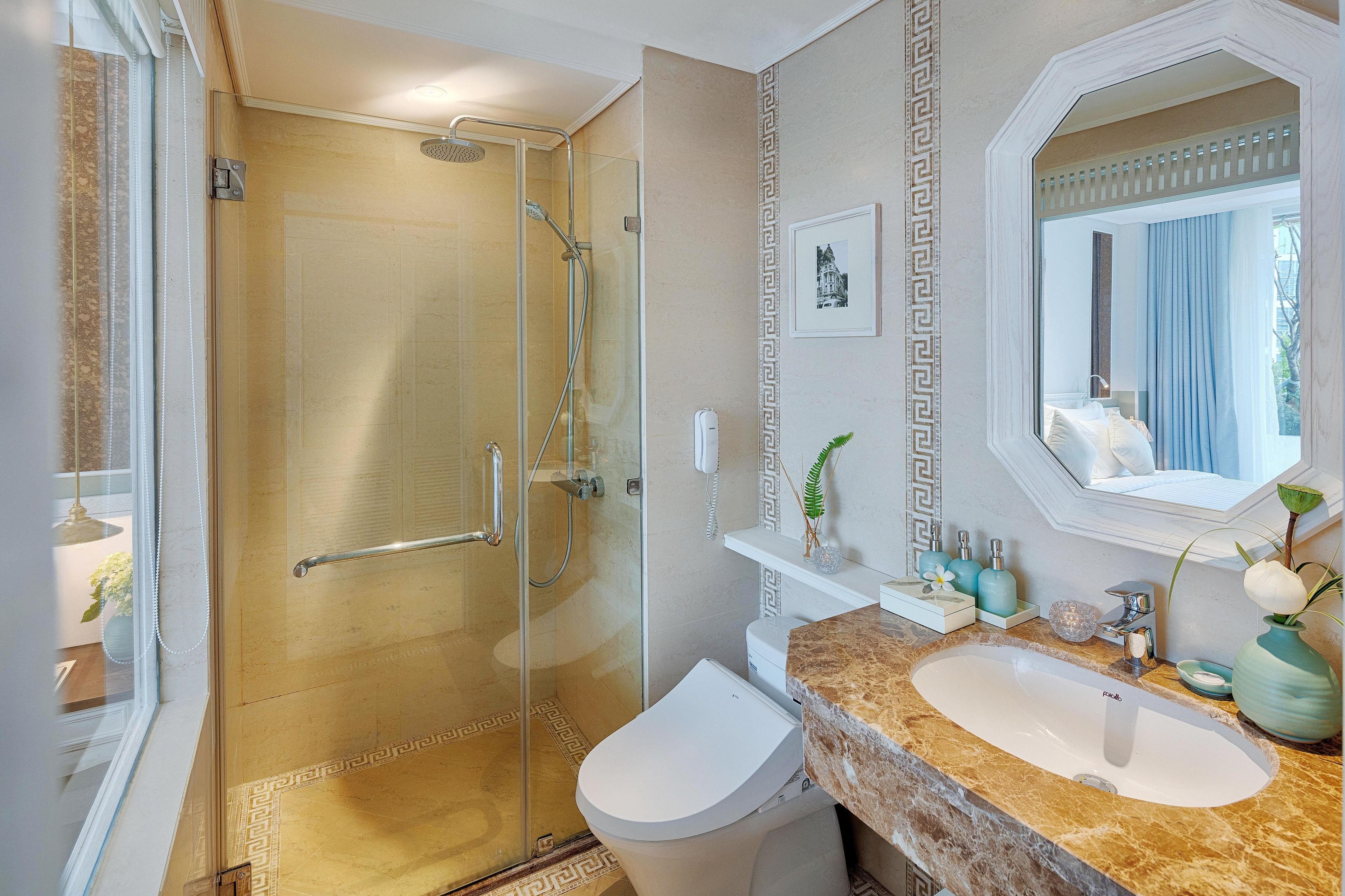 bonard junior suite + afternoon tea on rooftop | bathroom | shower, designer toiletries, hair dryer, bathrobes