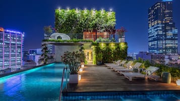 Outdoor pool, open 6:00 AM to 11:00 PM, pool umbrellas, pool loungers