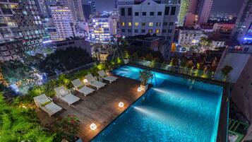 Outdoor pool, open 6:00 AM to 11:00 PM, pool umbrellas, pool loungers