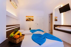Ropa de cama de alta calidad y tabla de planchar con plancha