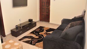 Apartment, 1 Bedroom | Living room - Trinity Suites (Lekki)