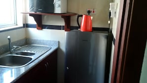 Standard Suite, 1 Bedroom | Private kitchen - Trinity Suites (Lekki)