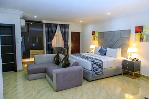 Superior Double Room | Living area | Flat-screen TV