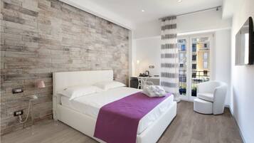 Suite | Luxe beddengoed, een minibar, een kluis op de kamer