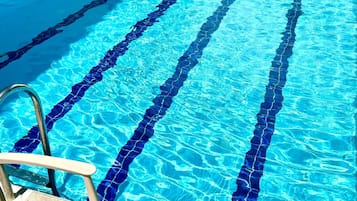 Outdoor pool, pool umbrellas, sun loungers
