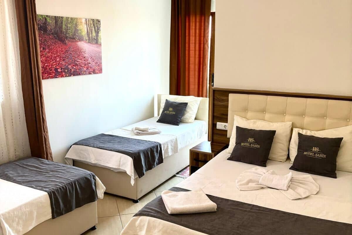 standard quadruple room | 1 bedroom, in-room safe, free wifi, bed sheets