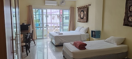 Triple Room | Premium bedding, pillowtop beds, in-room safe, blackout drapes