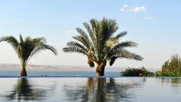 2 outdoor pools, pool umbrellas, pool loungers