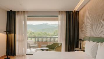 Deluxe Room, 1 Double Bed | Minibar, in-room safe, laptop workspace, iron/ironing board