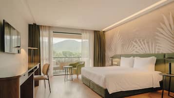 Deluxe Room, 1 Double Bed | Minibar, in-room safe, laptop workspace, iron/ironing board