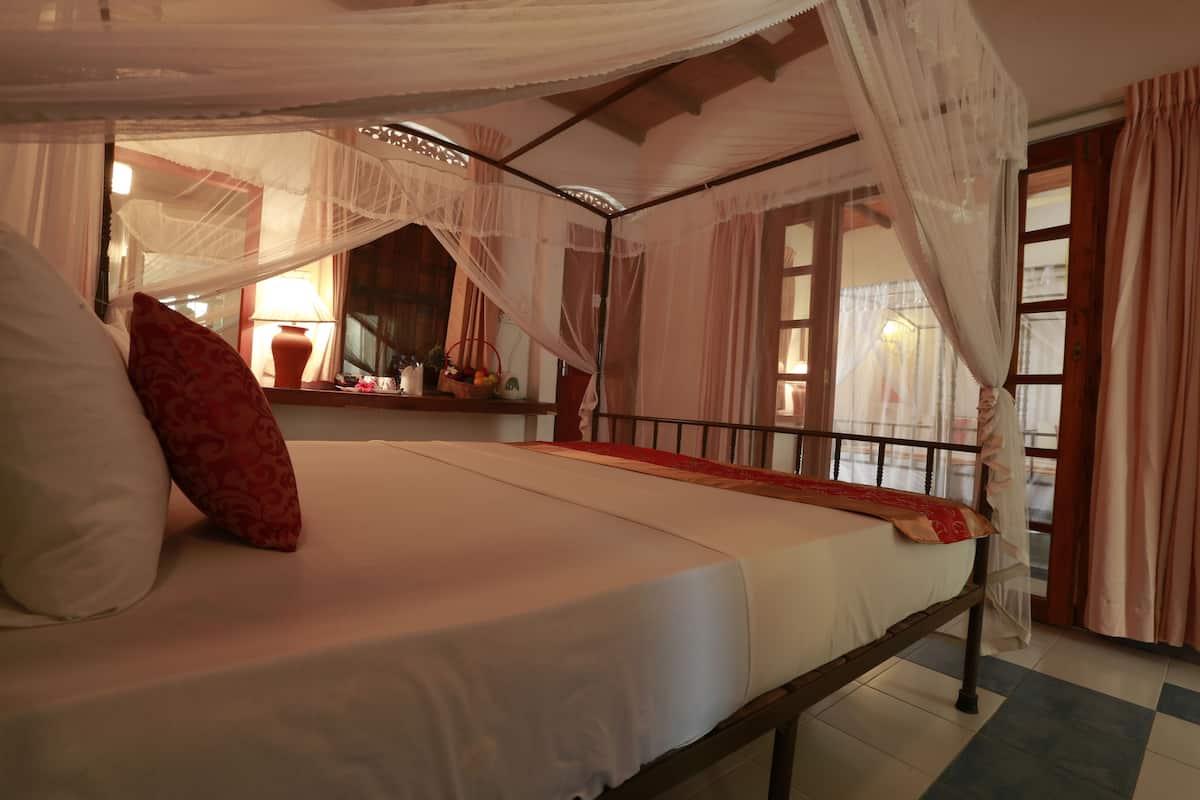 standard quadruple room, garden view | 1 bedroom, in-room safe, desk, soundproofing