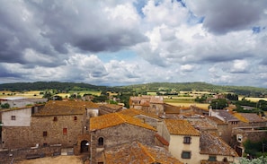 A historic village with traditional stone buildings and terracotta roofs. - Encís d Empordà (Corca)