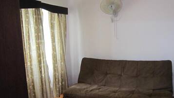 Basic Double Room, 1 Double Bed, Smoking | Living area | TV