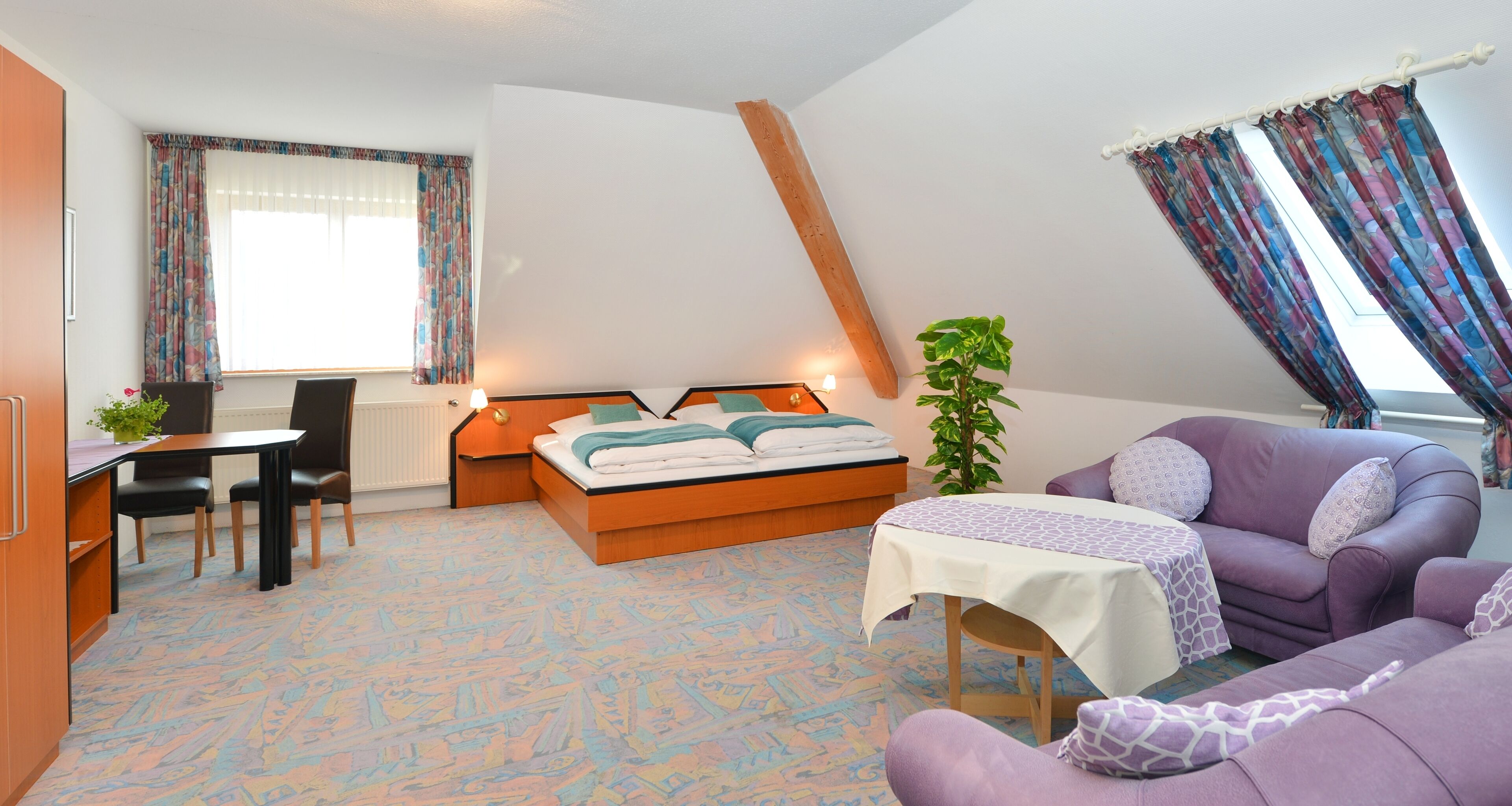 business double room | living area | flat-screen tv