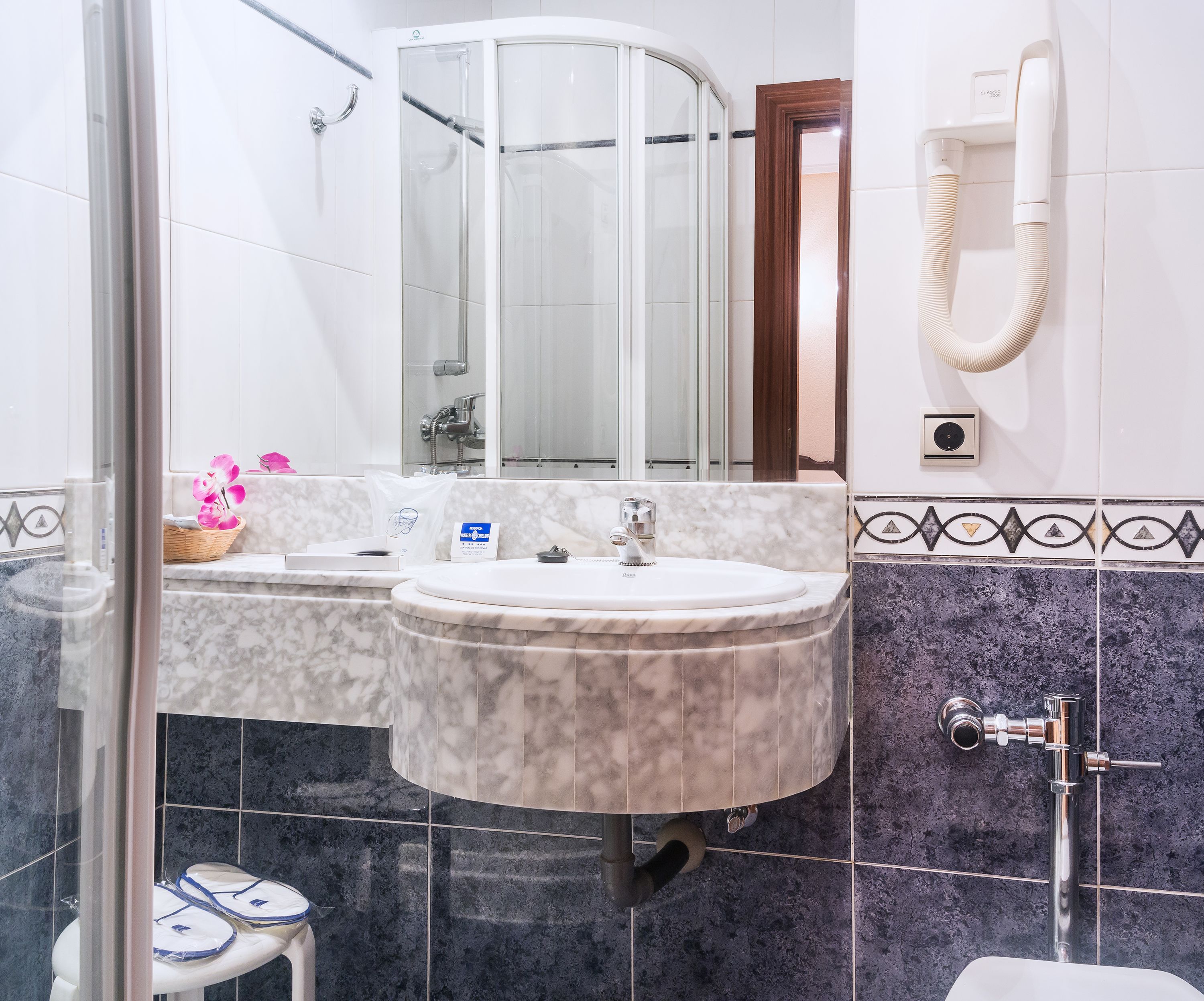 double room single use | bathroom | shower, free toiletries, hair dryer, towels