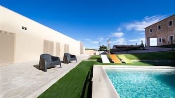 Indoor pool, outdoor pool, pool umbrellas, pool loungers