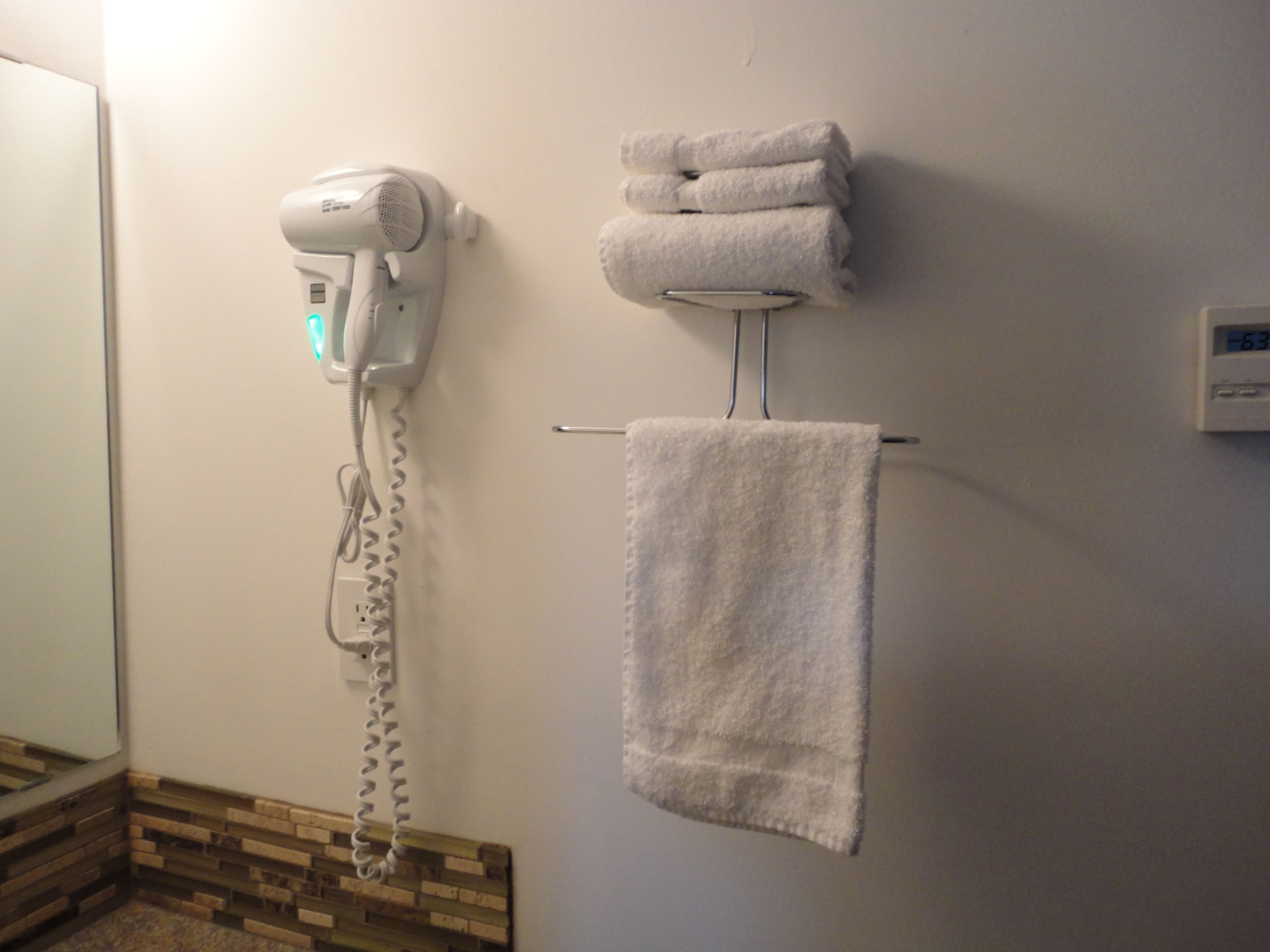 combined shower/bathtub, free toiletries, hair dryer, towels